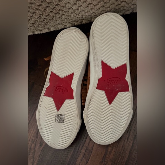 The sneakers are the ASH Marlow Fringe Lace Up High Top Sneakers. Size 38 - Picture 10 of 16